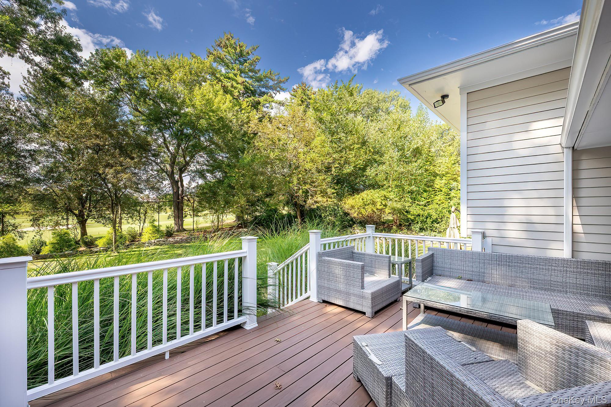 53 Country Ridge Drive Rye Brook, NY 10573 - Photo 36 of 50 a house view with a sitting space and garden