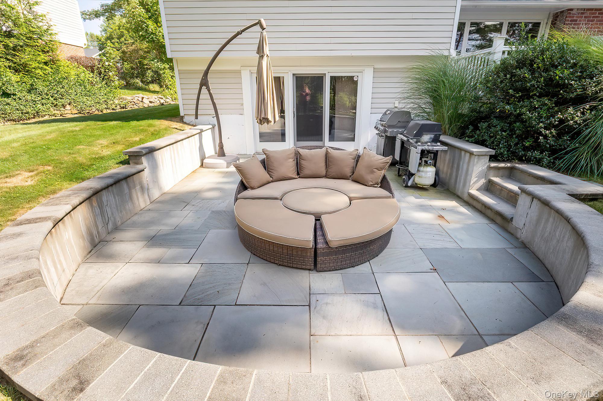53 Country Ridge Drive Rye Brook, NY 10573 - Photo 37 of 50 a view of a swimming pool with furniture