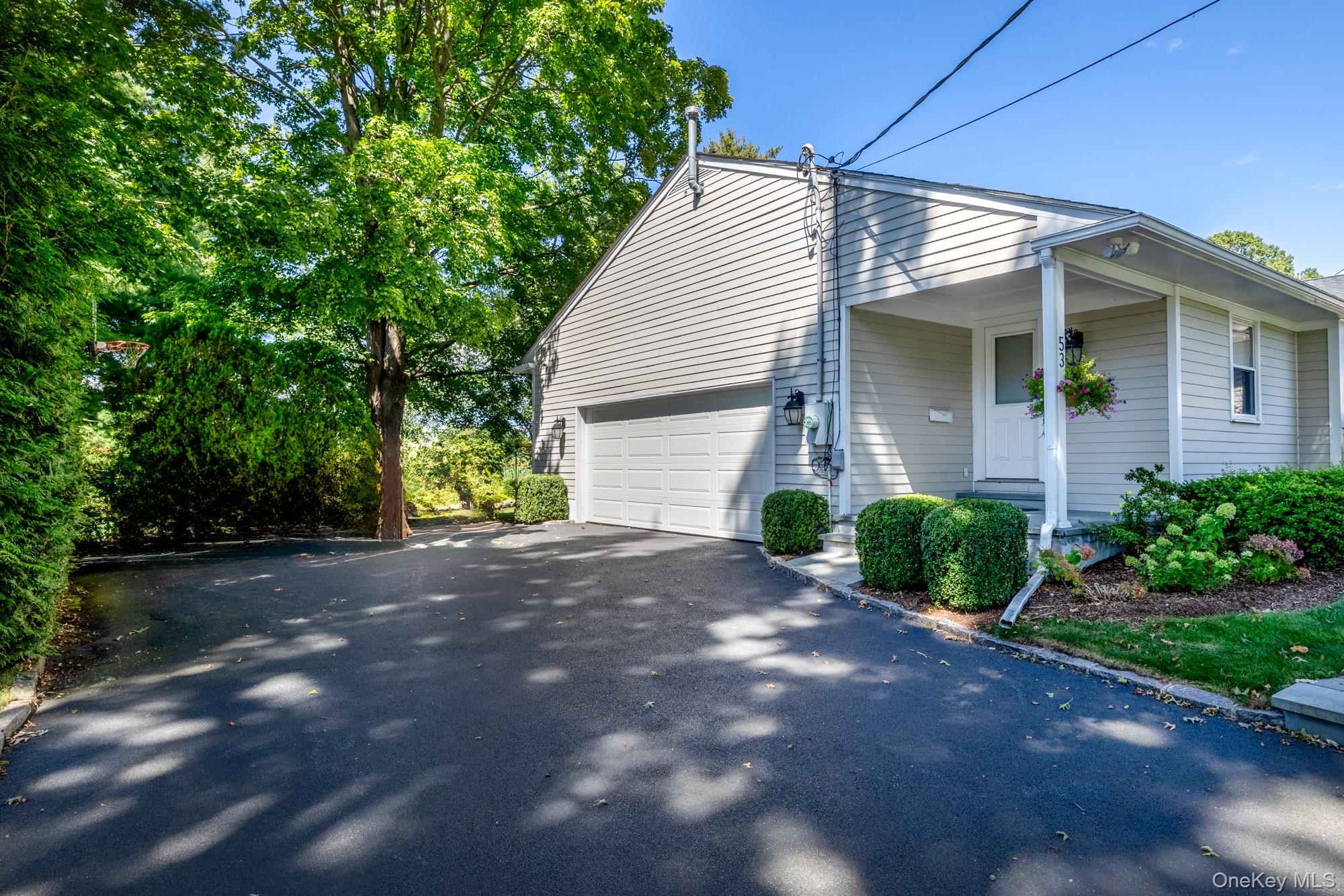 53 Country Ridge Drive Rye Brook, NY 10573 - Photo 42 of 50 a view of a house with a yard