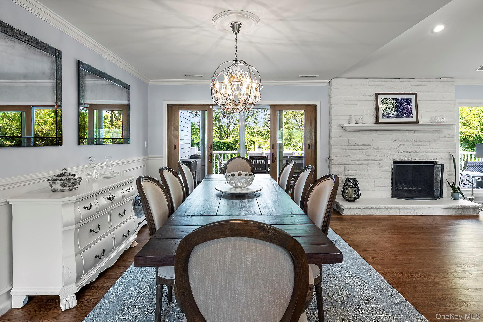 53 Country Ridge Drive Rye Brook, NY 10573 - Photo 10 of 50 a view of a dining room with furniture window and wooden floor