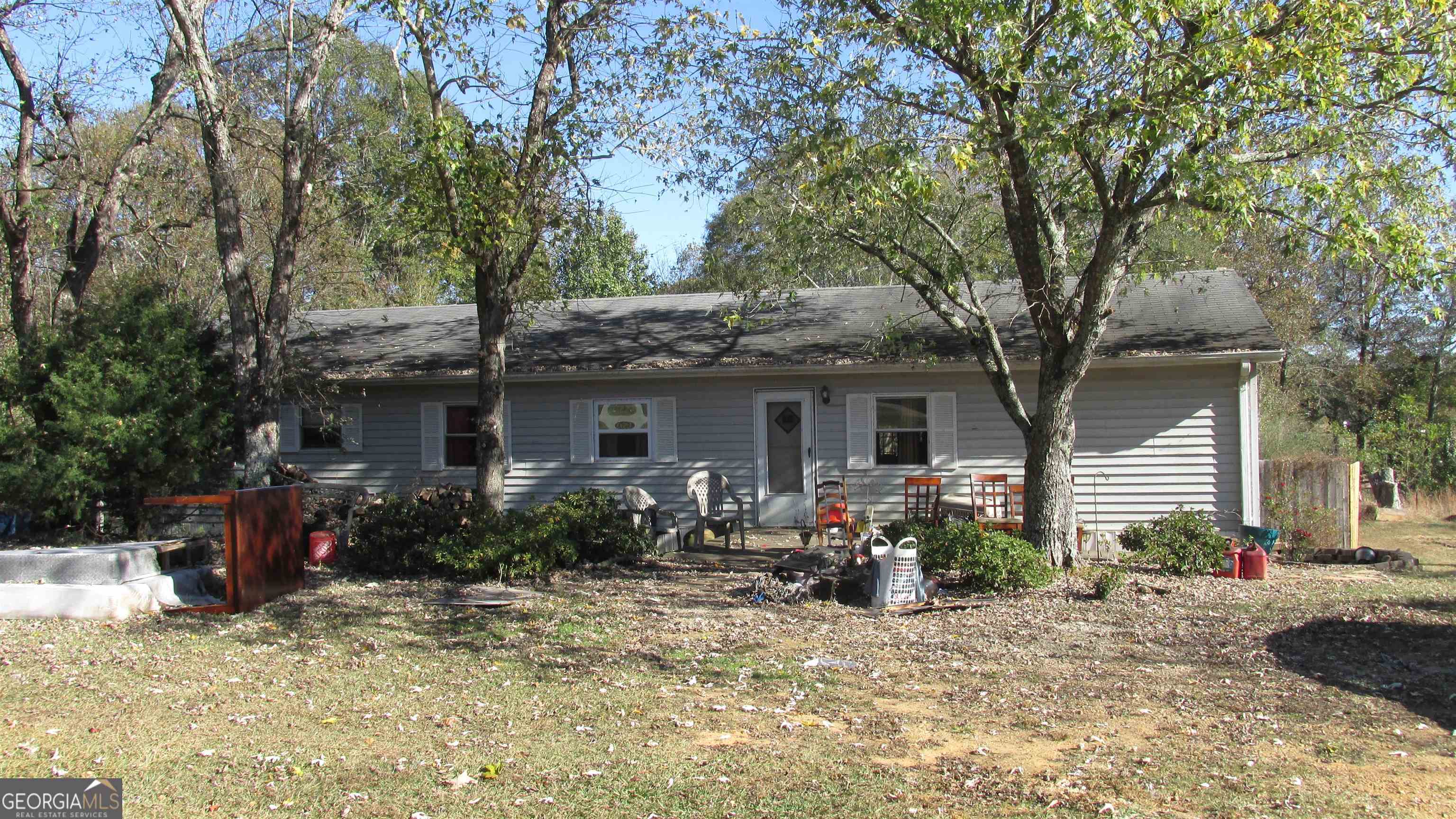 1120 Bethlehem Church Road Bethlehem, GA 30620 - Photo 1 of 1 a front view of house with yard outdoor seating and barbeque oven