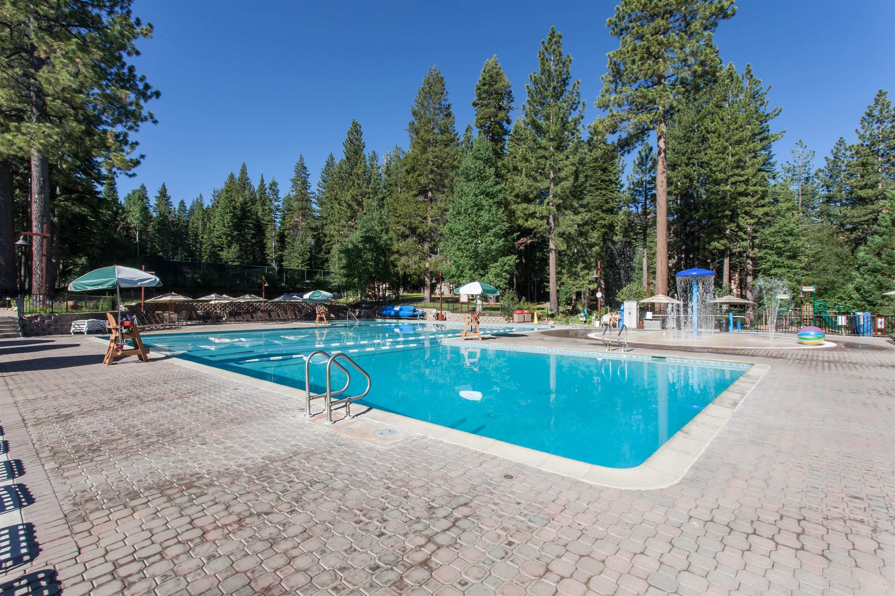 6038 Mill Camp Northstar, CA 96161 - Photo 19 of 28 a swimming pool with outdoor seating and yard