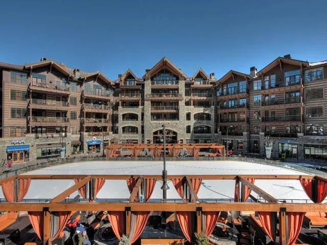 a view of street with tall buildings