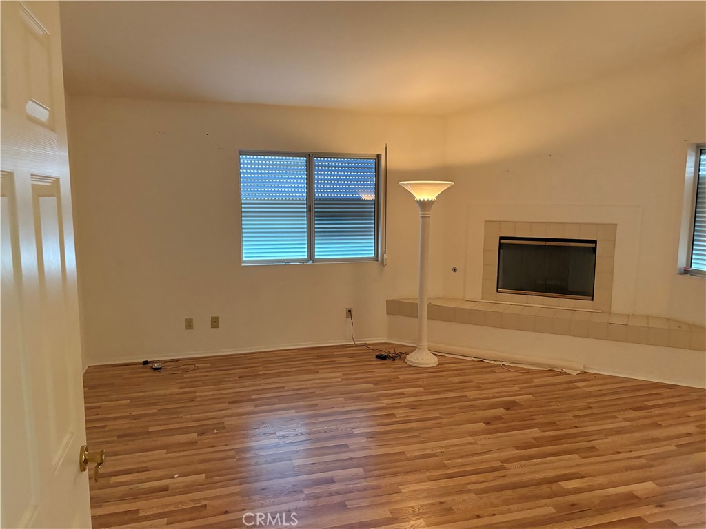 40135 Festival Road Murrieta, CA 92562 - Photo 13 of 35 a view of empty room with wooden floor