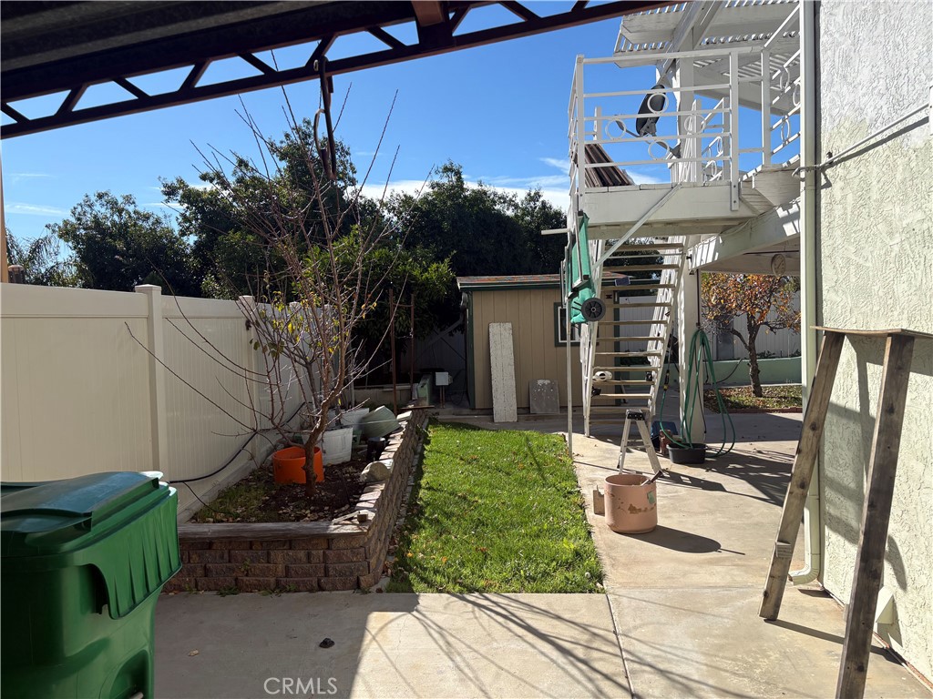 40135 Festival Road Murrieta, CA 92562 - Photo 23 of 35 a view of a chairs and table in backyard