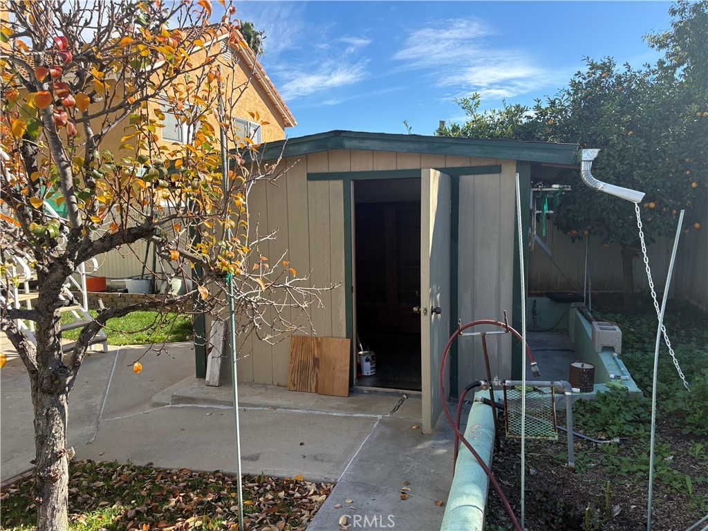 40135 Festival Road Murrieta, CA 92562 - Photo 25 of 35 a front view of a house with garden