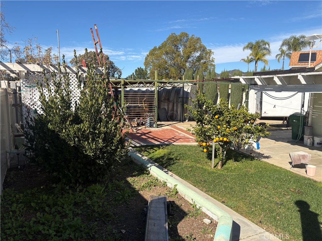 40135 Festival Road Murrieta, CA 92562 - Photo 26 of 35 a view of a patio with table and chairs and potted plants