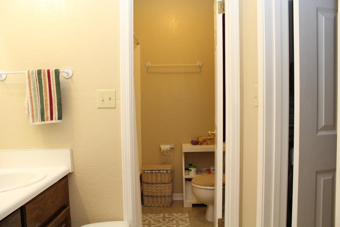 705 Valley Road Crestview, FL 32539 - Photo 12 of 20 a bathroom with a sink and a toilet