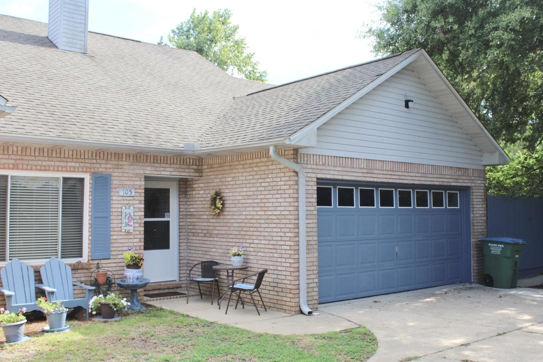 705 Valley Road Crestview, FL 32539 - Photo 2 of 20 a backyard of a house with outdoor seating