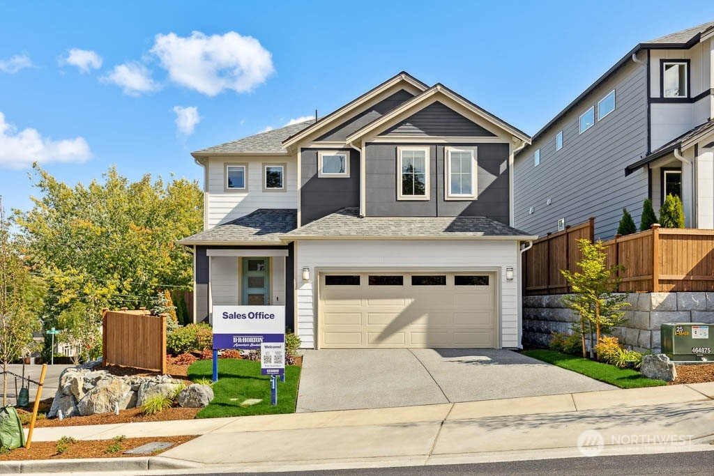 22825 20th Place West Bothell, WA 98021 - Photo 1 of 35 a front view of a house with garden
