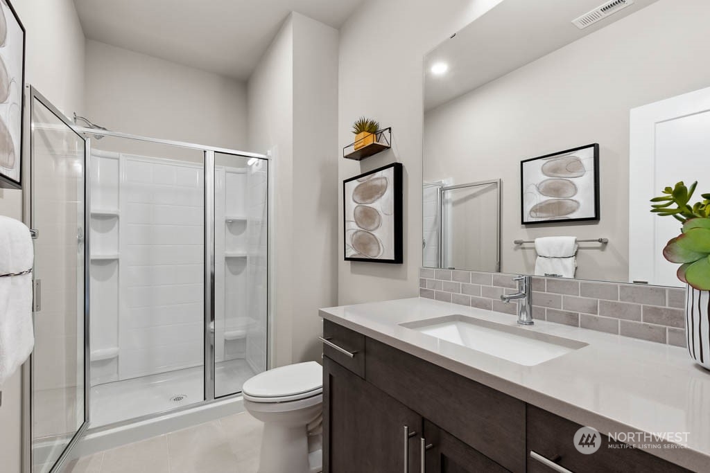 22825 20th Place West Bothell, WA 98021 - Photo 17 of 35 a bathroom with a sink toilet and shower