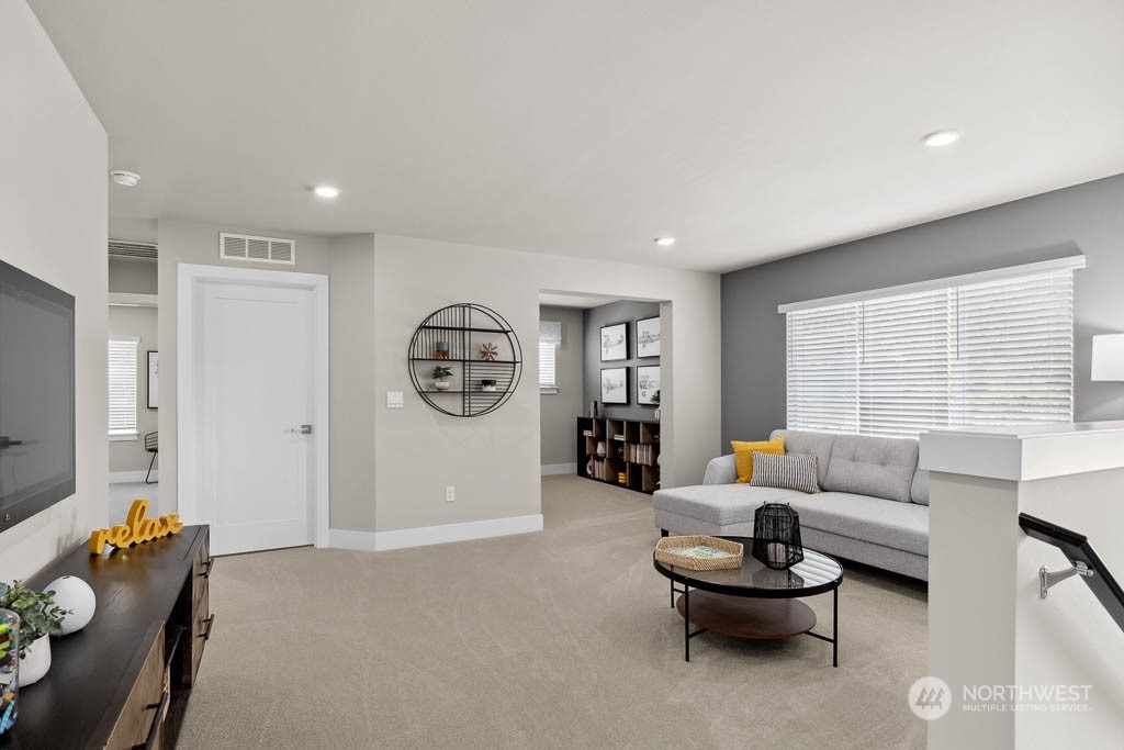 22825 20th Place West Bothell, WA 98021 - Photo 18 of 35 a living room with furniture and a large window