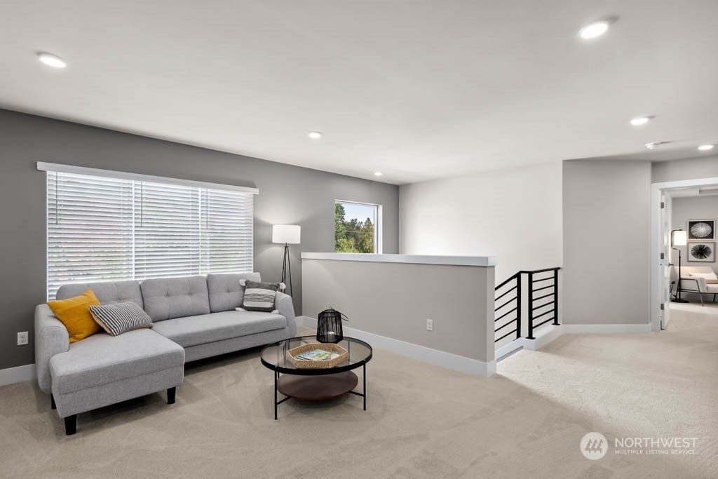 22825 20th Place West Bothell, WA 98021 - Photo 19 of 35 a living room with furniture and a large window