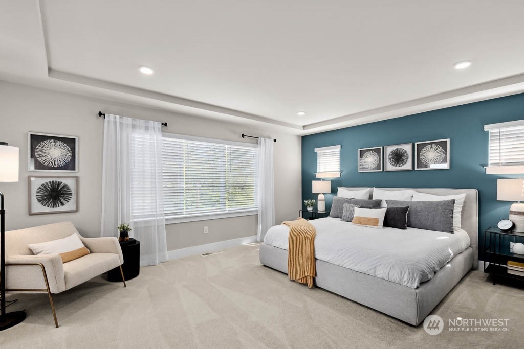 22825 20th Place West Bothell, WA 98021 - Photo 20 of 35 a bedroom with a bed and a couch