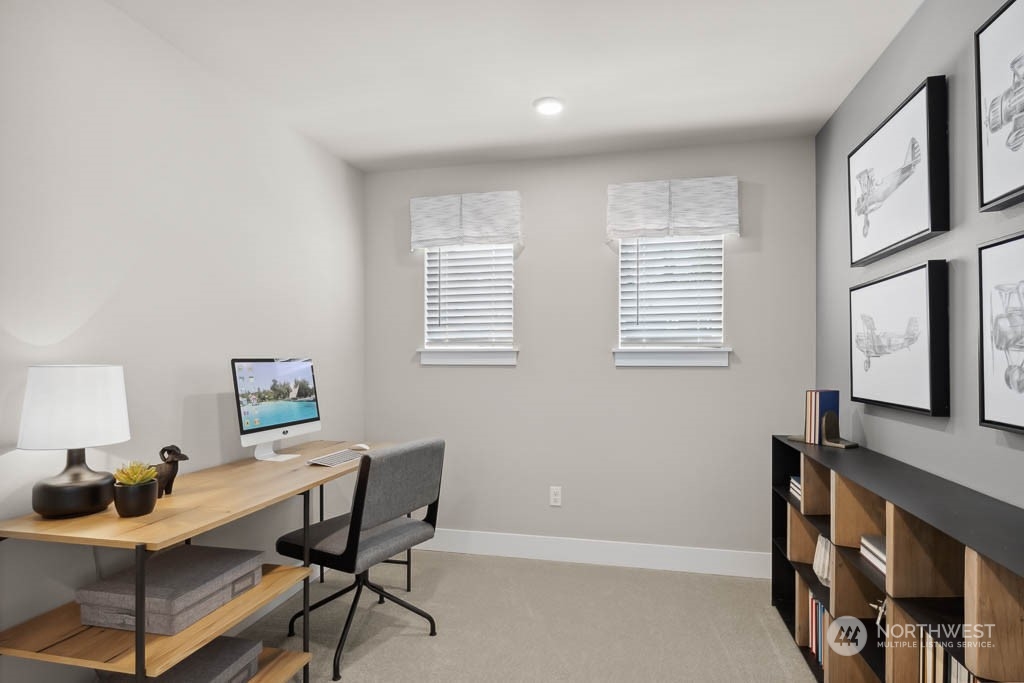 22825 20th Place West Bothell, WA 98021 - Photo 30 of 35 a view of a workspace with furniture and a window