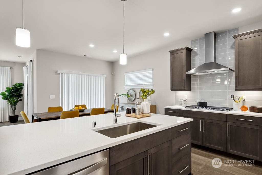 22825 20th Place West Bothell, WA 98021 - Photo 5 of 35 a kitchen with a sink and a refrigerator