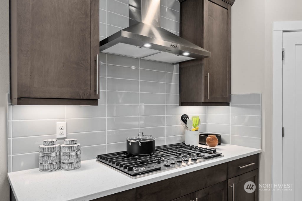 22825 20th Place West Bothell, WA 98021 - Photo 8 of 35 a kitchen with a stove and a sink