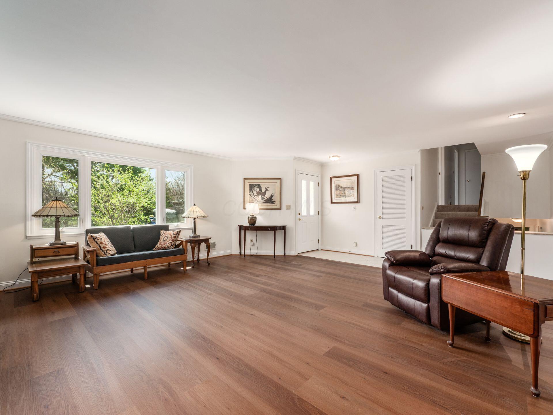 2252 Johnston Road Columbus, OH 43220 - Photo 9 of 50 Living Room - 19'1" x 17'7", Wood Floors, Large Picture Window, Fireplac