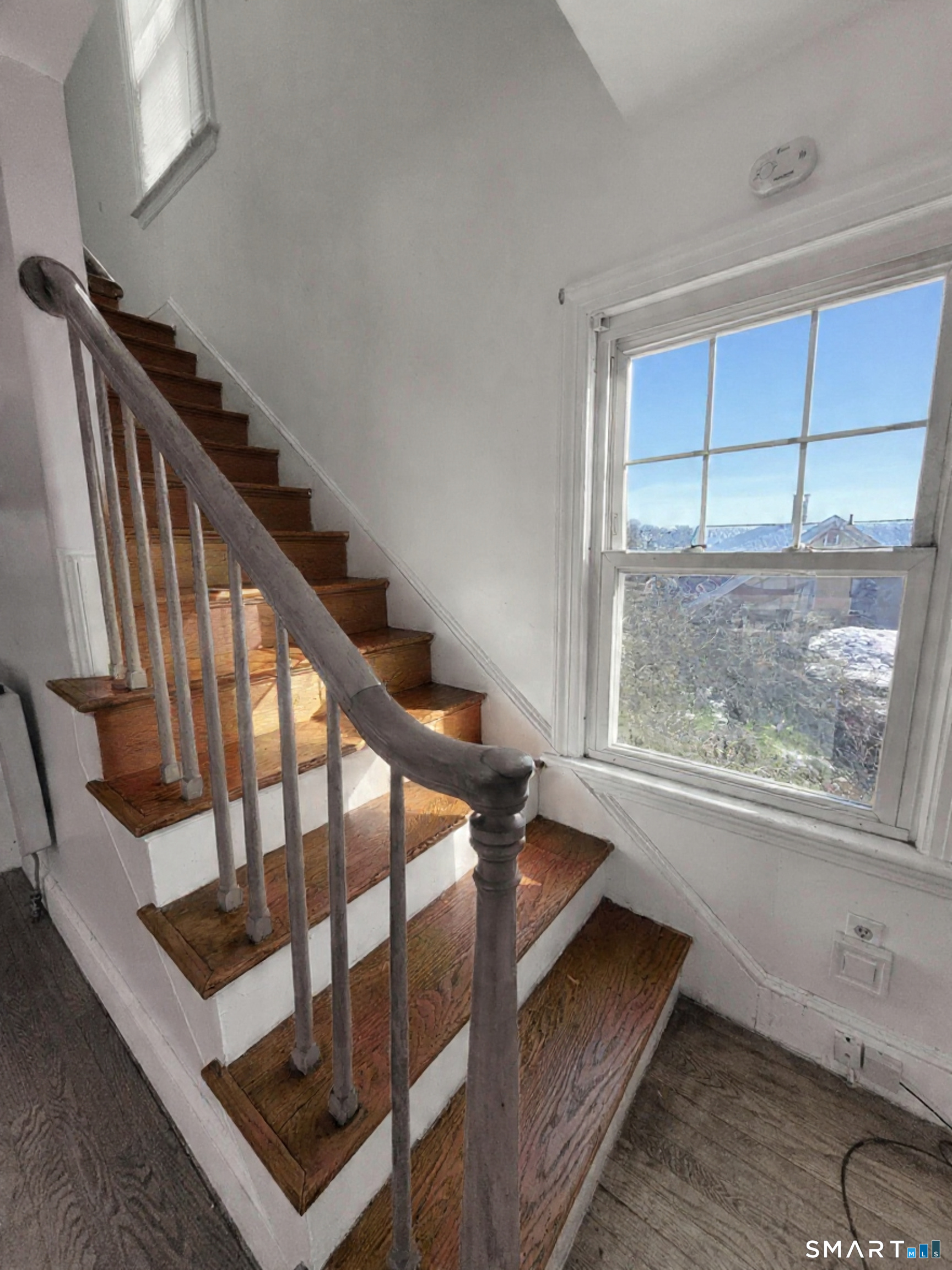 96 Tudor Street Waterbury, CT 06704 - Photo 10 of 15 a view of entryway and hall with wooden floor