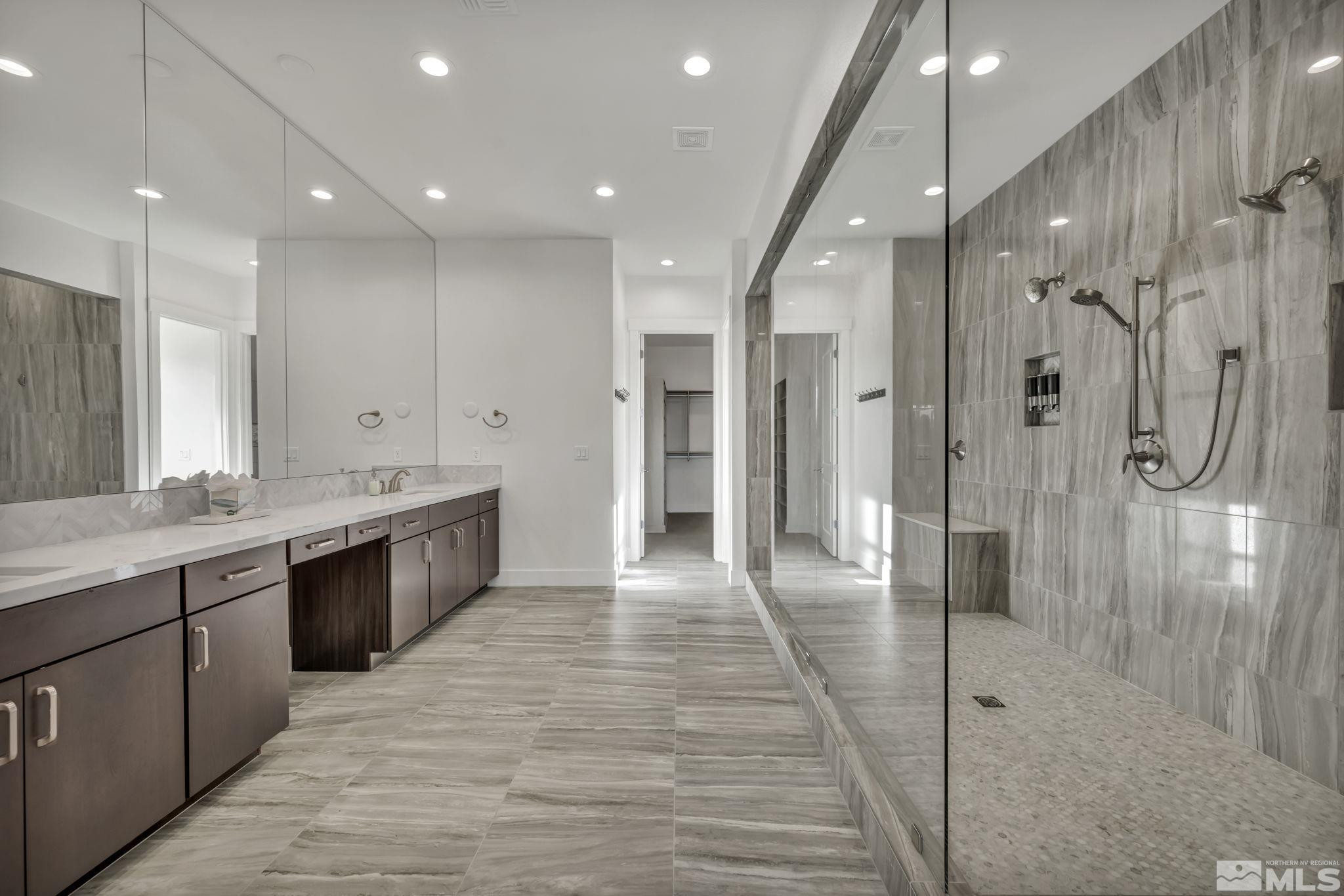 9525 Copper Sky Drive Reno, NV 89521 - Photo 22 of 40 a large bathroom with a sink and a shower
