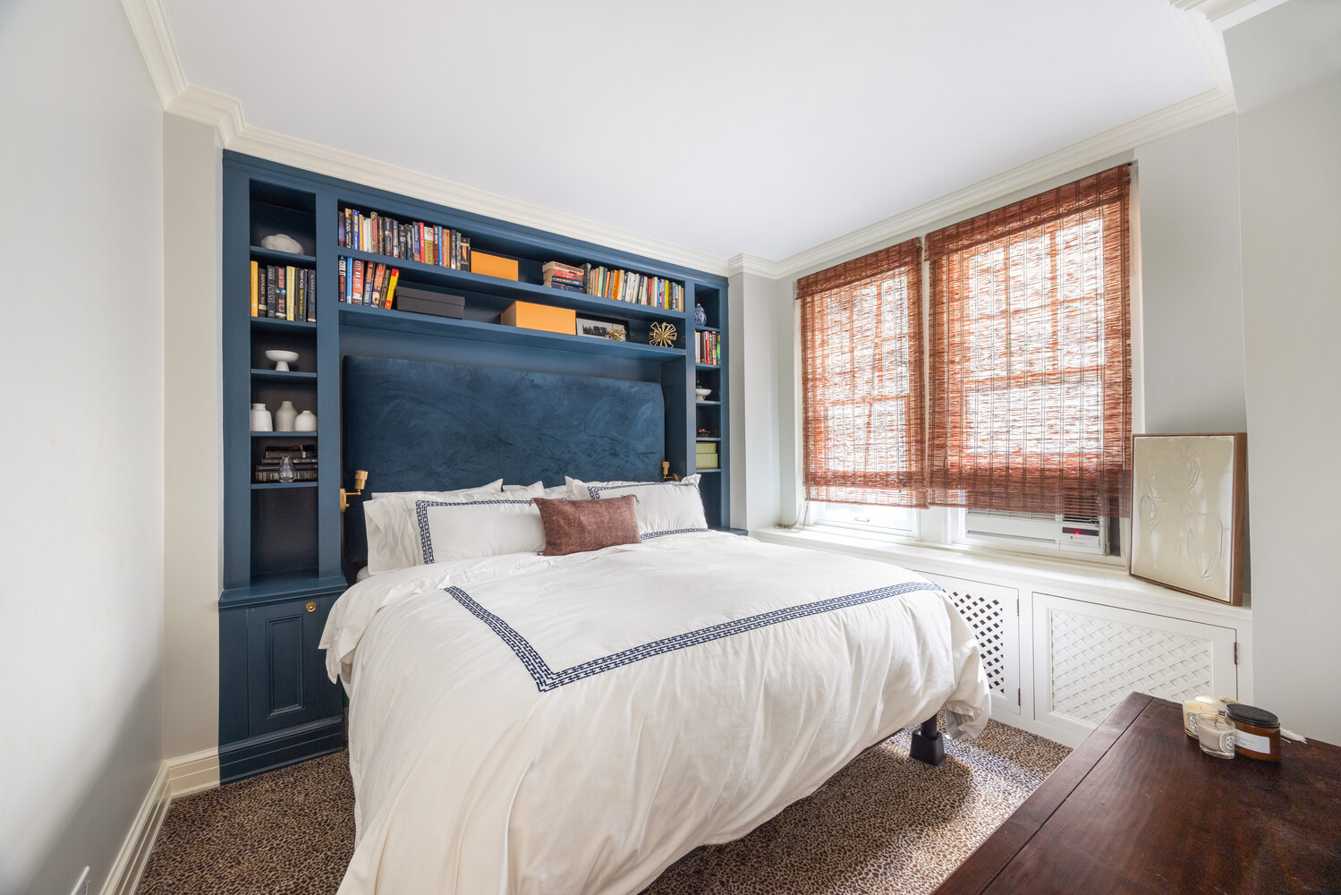 125 East 74th Street, Unit 4A Manhattan, NY 10021 - Photo 8 of 10 a bed sitting in a bedroom next to a window