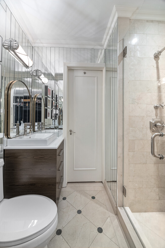 125 East 74th Street, Unit 4A Manhattan, NY 10021 - Photo 9 of 10 a bathroom with a sink toilet and shower