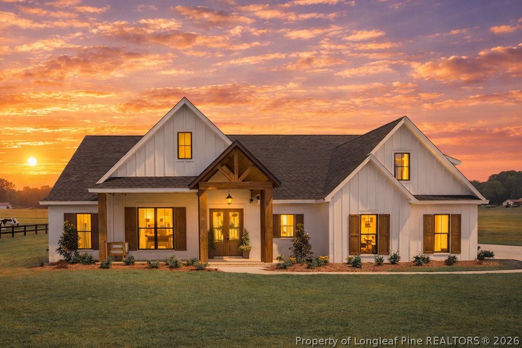 front view of a house with a yard