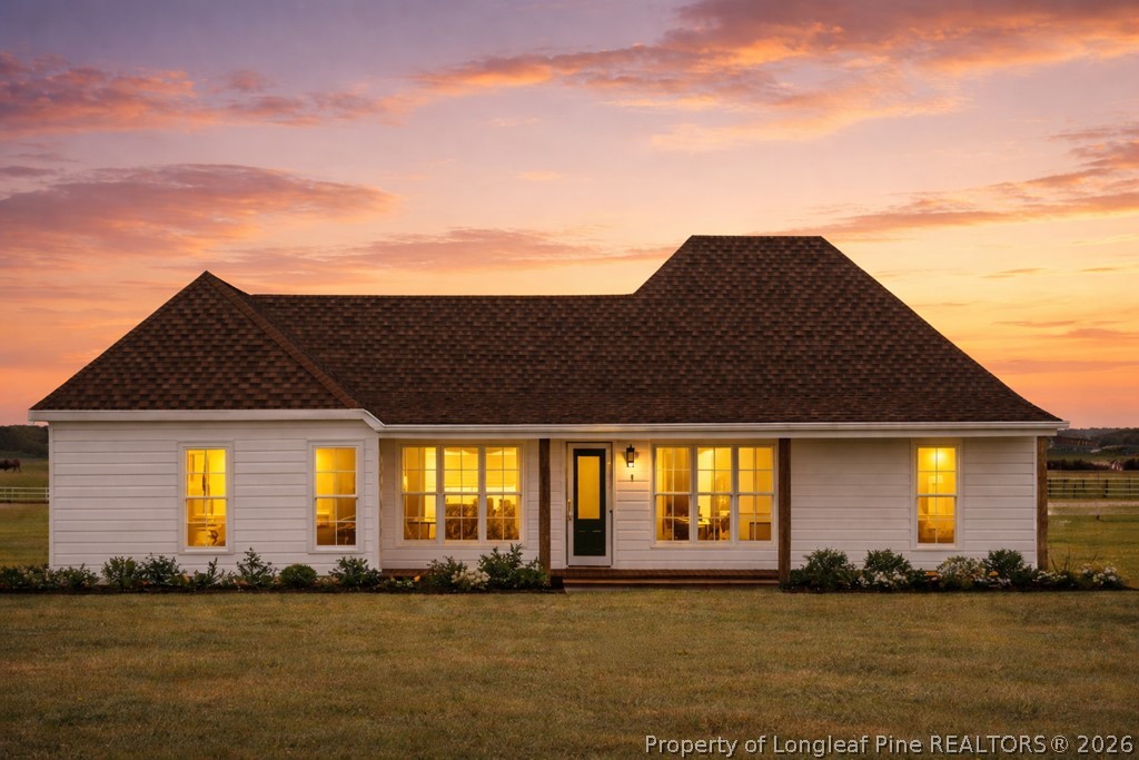 0 Paddock Meadows Red Springs, NC 28377 - Photo 2 of 26 a front view of a house with a yard