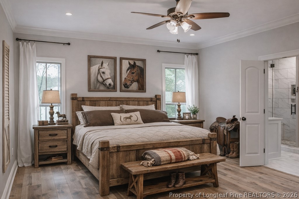 0 Paddock Meadows Red Springs, NC 28377 - Photo 7 of 26 a bedroom with a bed and wooden floor
