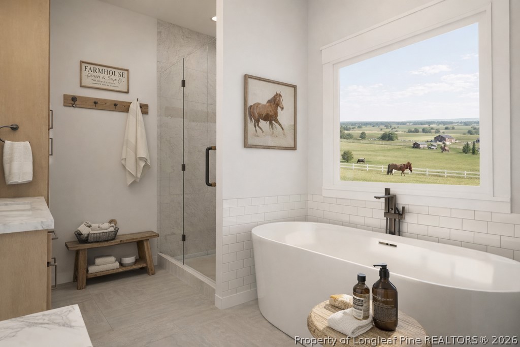 0 Paddock Meadows Red Springs, NC 28377 - Photo 9 of 26 a bathroom with a tub and a sink