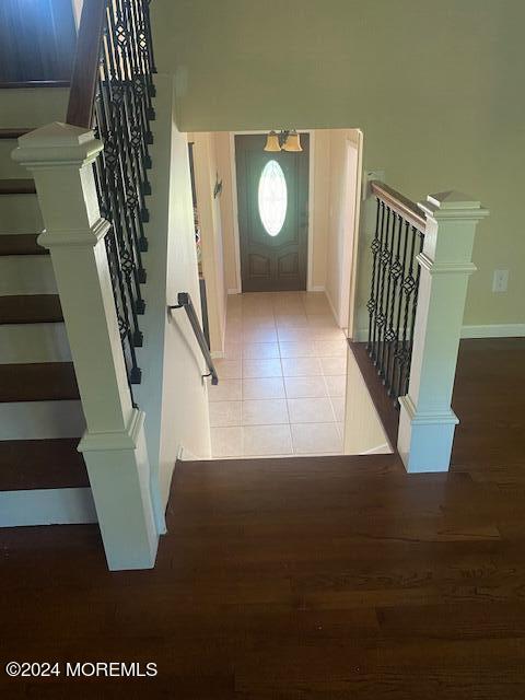 a view of an entryway with wooden floor