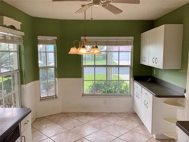 a view of a room with a large window