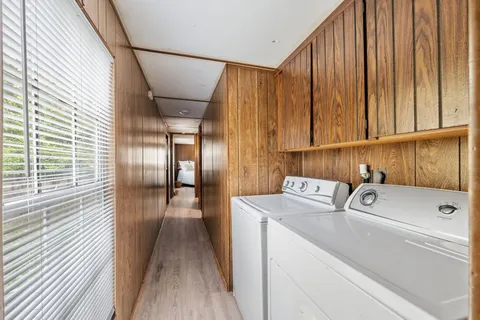 a backyard of a house with lots of green space