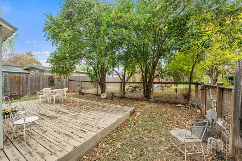a view of a backyard with a patio