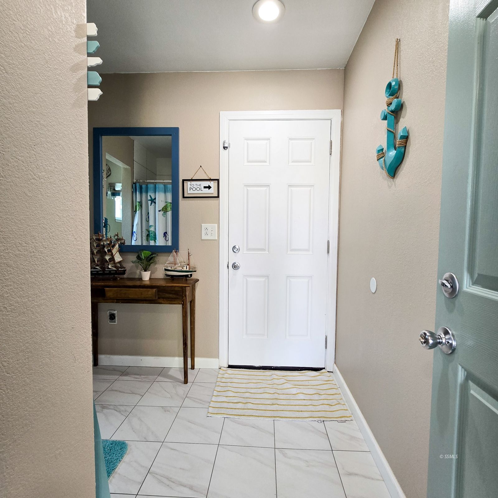 316 South Lilac Street Ridgecrest, CA 93555 - Photo 21 of 45 a view of a hallway to dining room and wooden floor