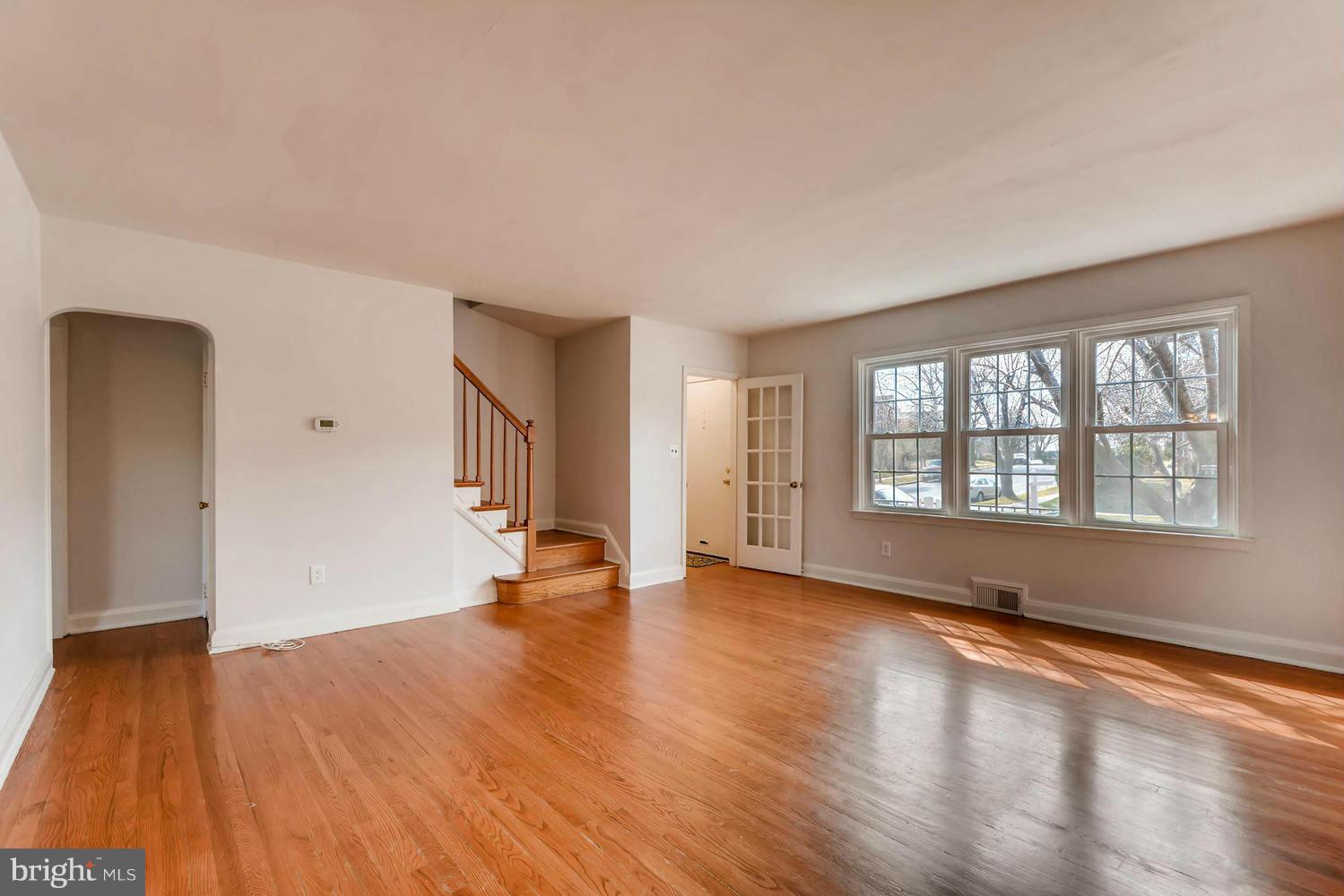 1612 Feldbrook Road Towson, MD 21286 - Photo 11 of 30 LIVING ROOM HAS DOORWAY TO BASEMENT STAIRS