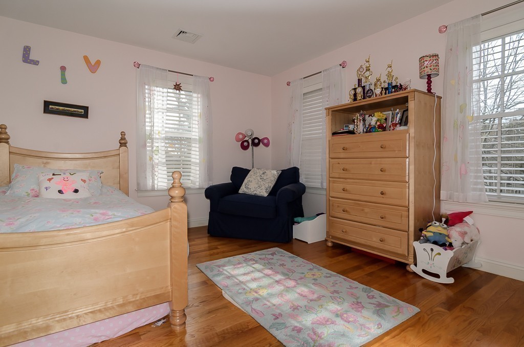 14 Massasoit Road Wellesley, MA 02481 - Photo 13 of 29 a living room with furniture and a window