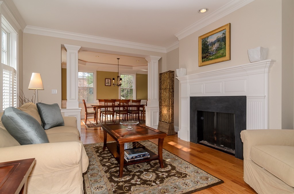 14 Massasoit Road Wellesley, MA 02481 - Photo 3 of 29 a living room with furniture and a fireplace