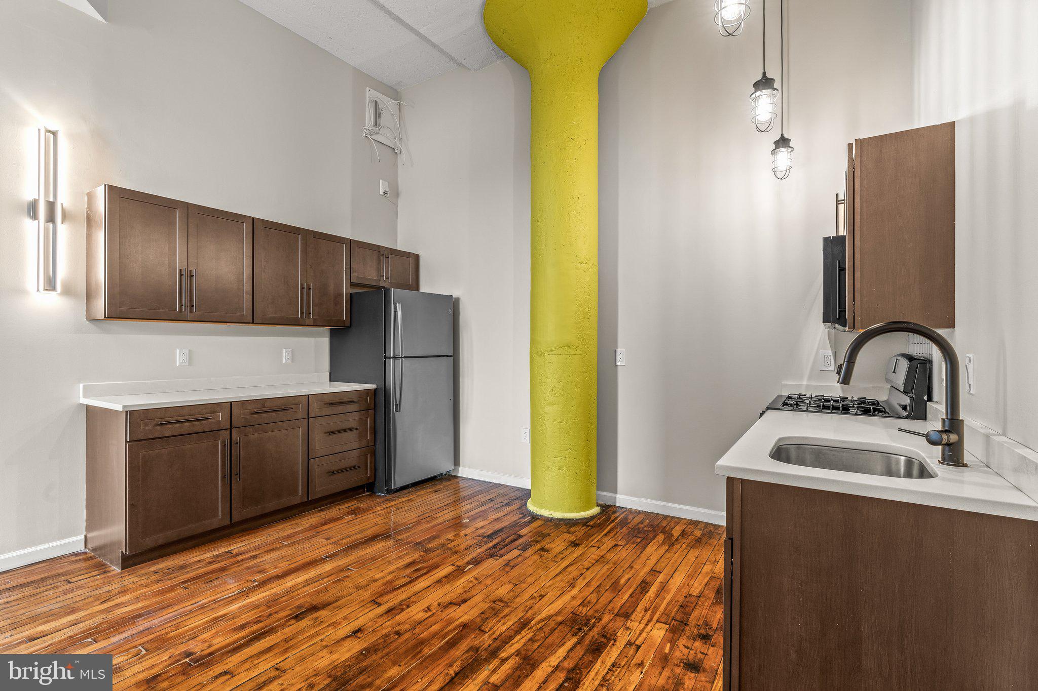 1217-35 Spring Garden Street, Unit 304 Philadelphia, PA 19123 - Photo 11 of 24 Open Concept Kitchen + Dining