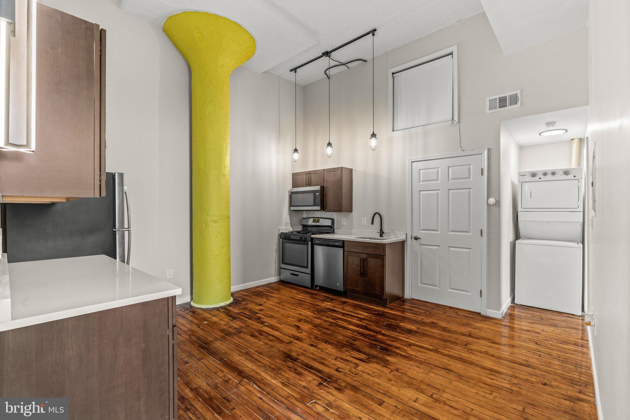 1217-35 Spring Garden Street, Unit 304 Philadelphia, PA 19123 - Photo 10 of 24 Open Concept Kitchen + Dining