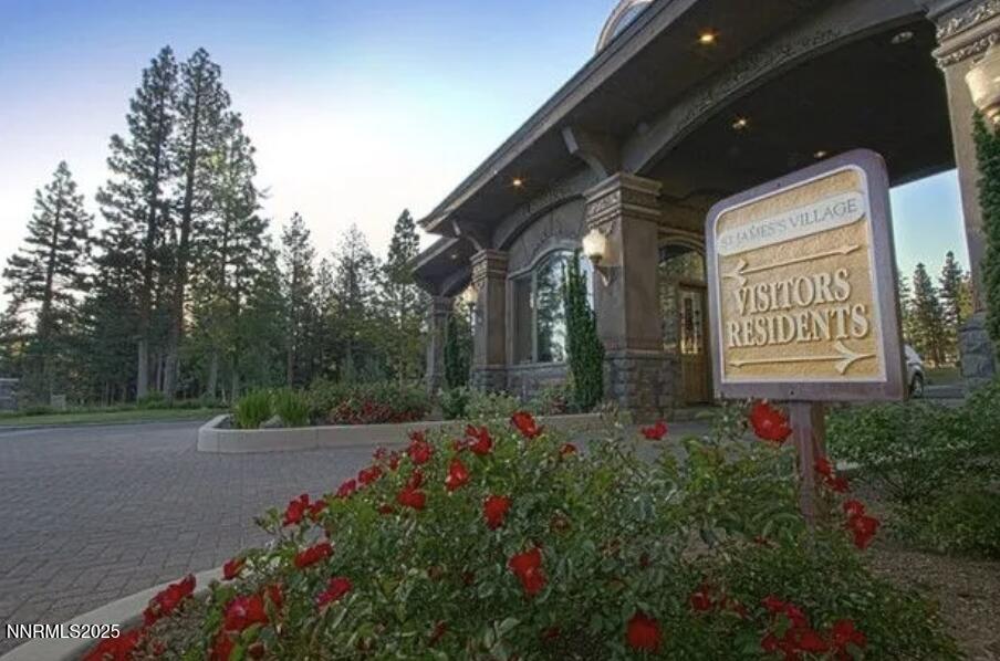 32 Bennington Court Reno, NV 89511 - Photo 9 of 29 a sign that is sitting in front of flowers