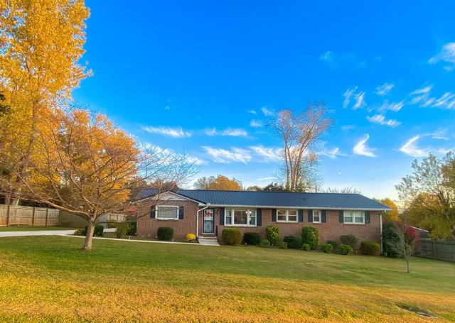 a view of a house with a big yard
