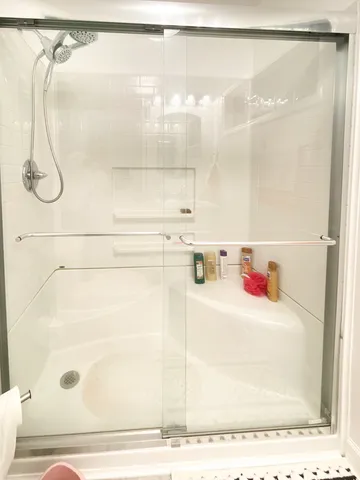 a bathroom with a sink vanity and a mirror