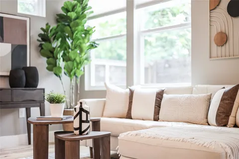 a bathroom with a sink a mirror and a shower