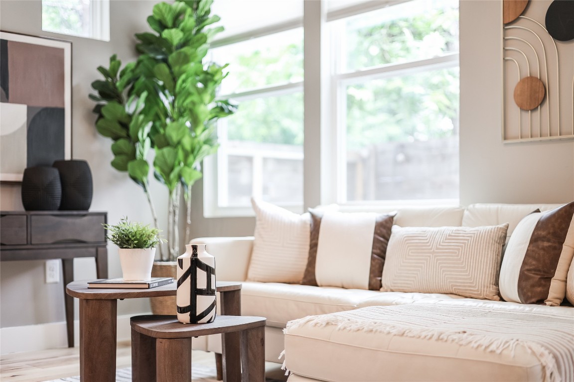 5512 Duval Street, Unit 2 Austin, TX 78751 - Photo 12 of 39 a living room with a large window and a fireplace