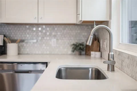 a view of staircase with white walls