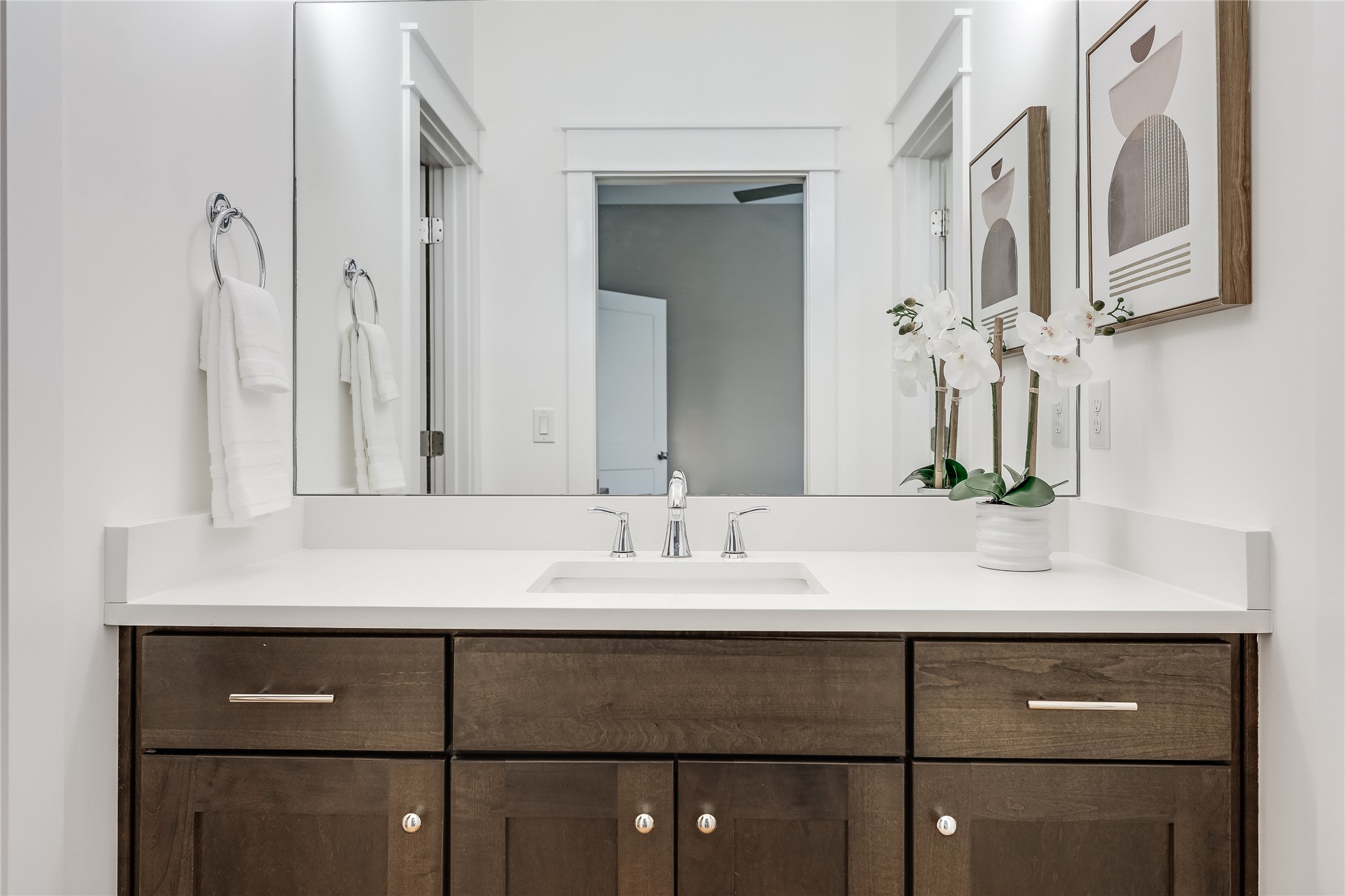 5512 Duval Street, Unit 2 Austin, TX 78751 - Photo 27 of 39 a bathroom with a sink vanity and a mirror
