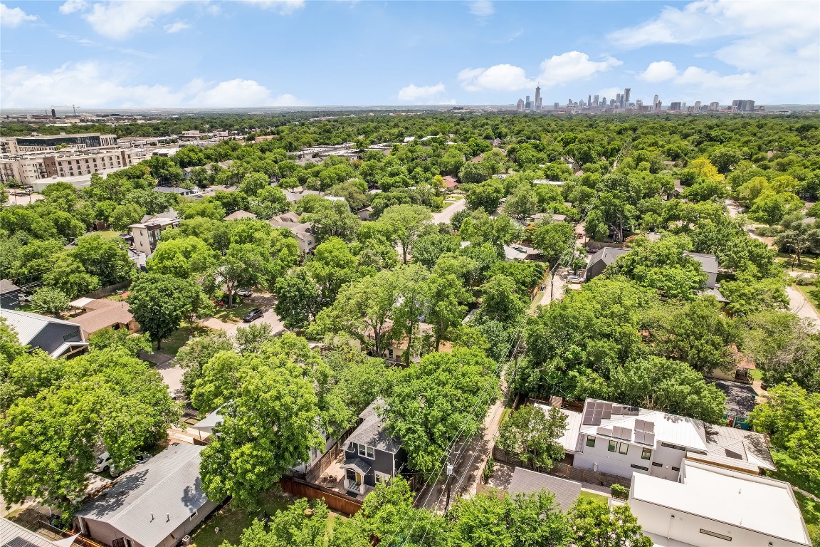 5512 Duval Street, Unit 2 Austin, TX 78751 - Photo 37 of 39 a view of a green field with lots of bushes