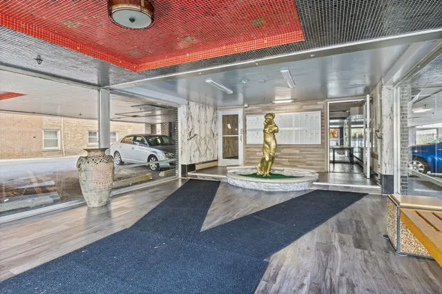 a view of a hallway with a white walls