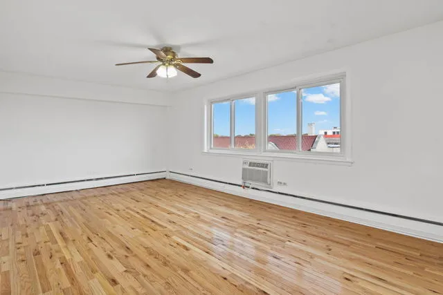 a bathroom with a sink toilet and vanity
